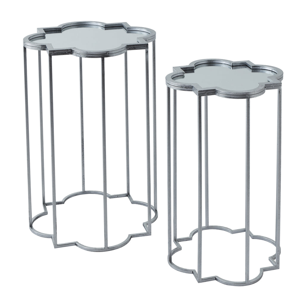 Set of two silver side tables with mirror tops on a white background