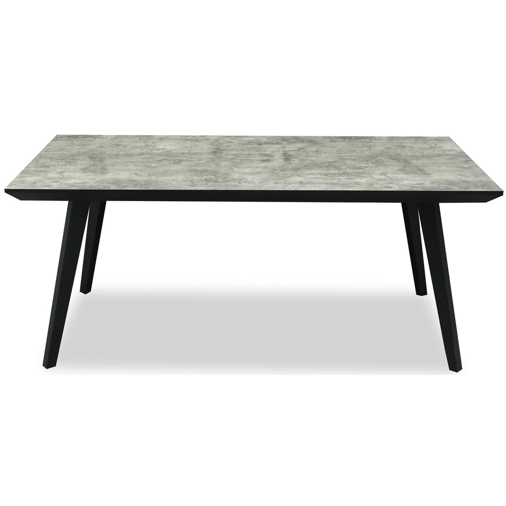 Rectangular table with gray concrete top and black legs on a white background