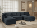 Modern dark blue sectional sofa in a living room setting with decor elements.