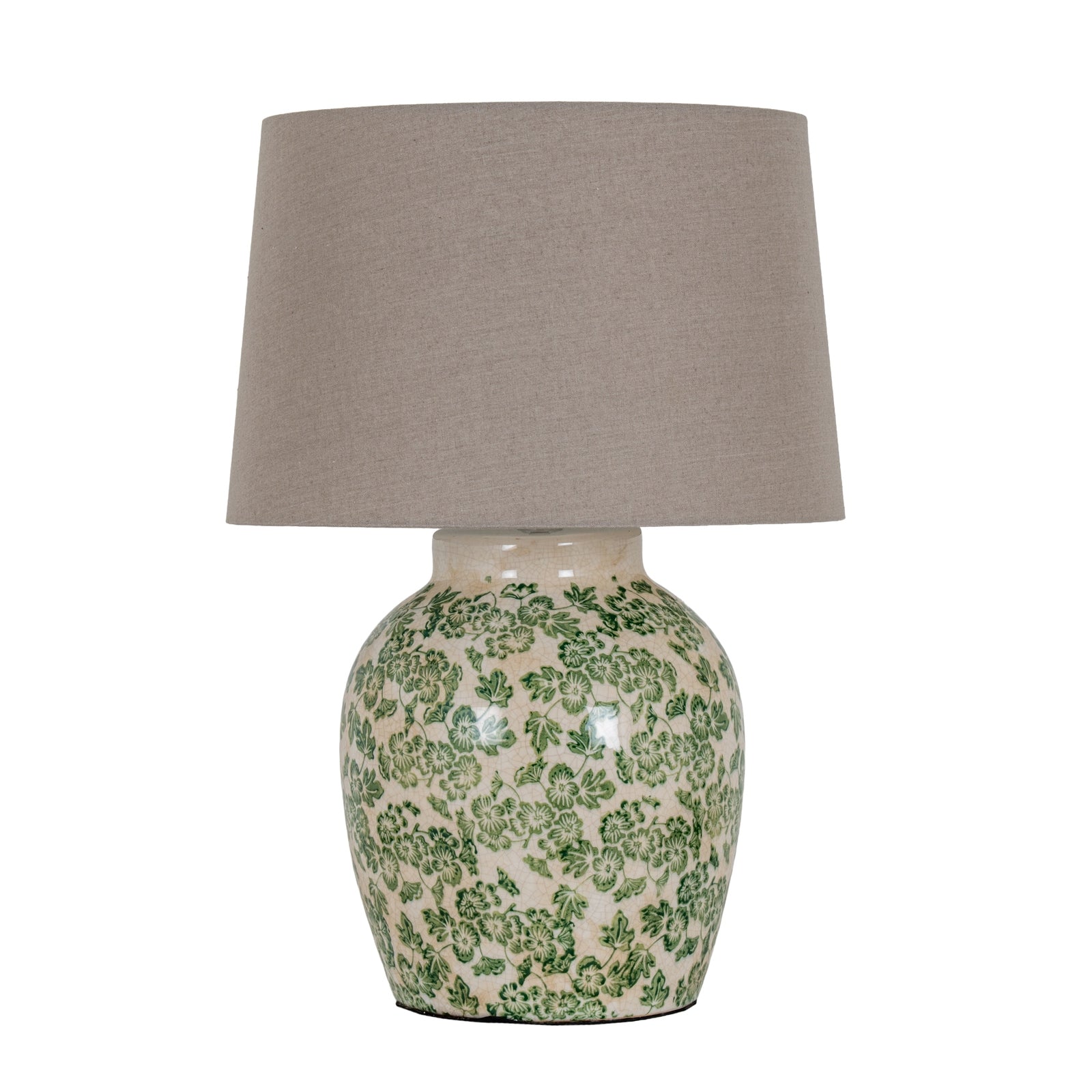 Table lamp with green floral pattern on a white background