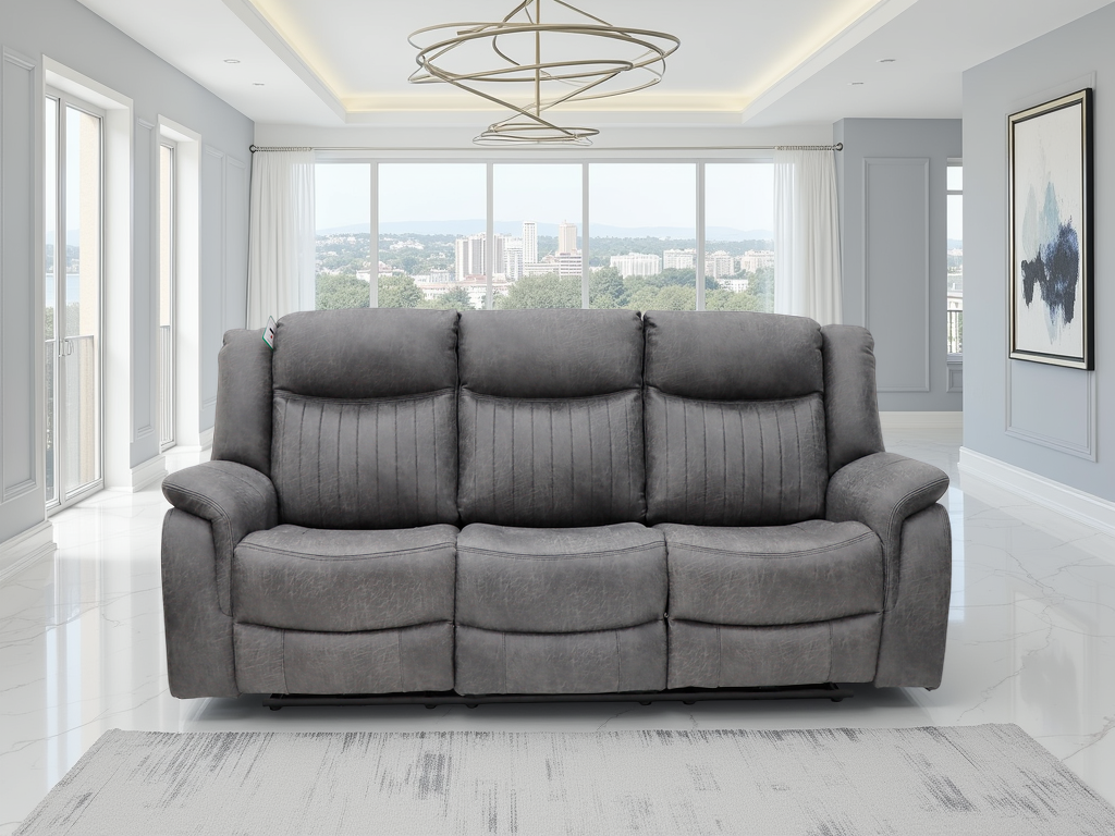 Gray sofa in a modern living room with large windows.
