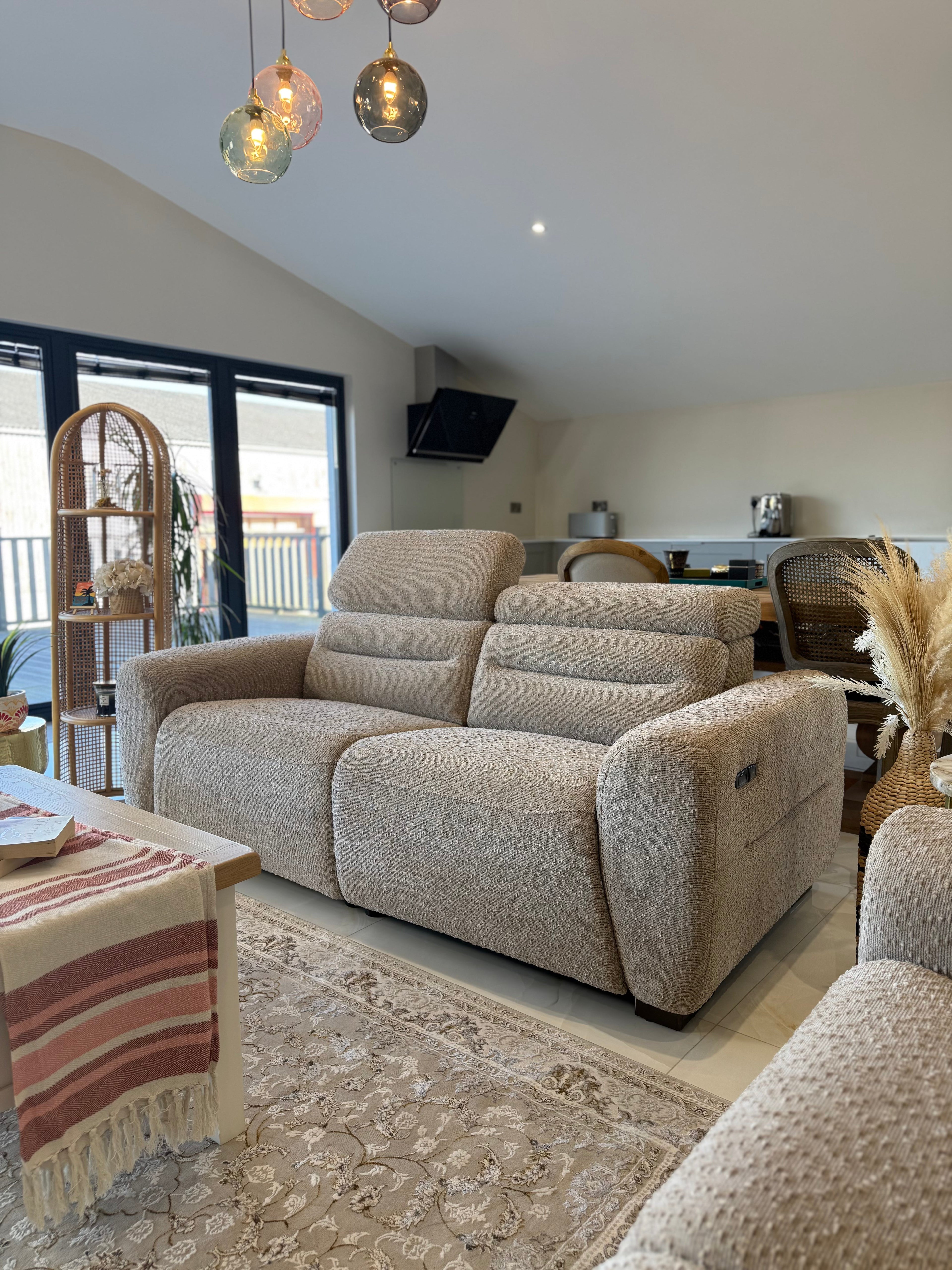 Beige sofa in a living room with decorative elements